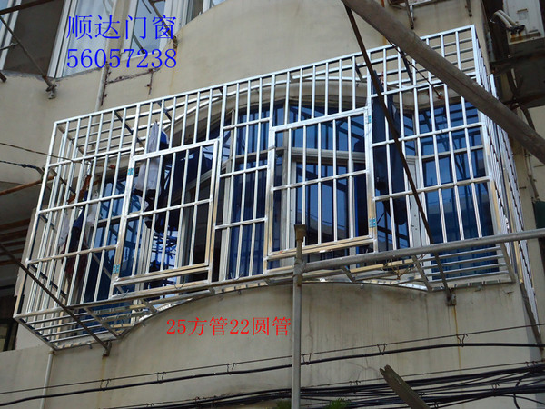 不锈钢防盗窗防护网阳台护栏 定做凤铝隔断移门花架雨蓬 顺达门窗