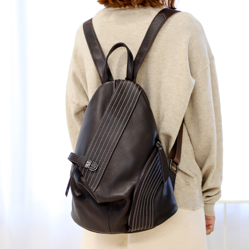 cuir véritable double-épaule femme sac à 2019 nouvelle europe et de l'amérique marée de la marque de mode joker en cuir souple sac à dos de verrouillage anti-vol de sac de voyage cuir véritable double-épaule femme sac à 2019 nouvelle europe et de l'amérique marée de la marque de mode joker en cuir souple sac à dos de verrouillage anti-vol de sac de voyage