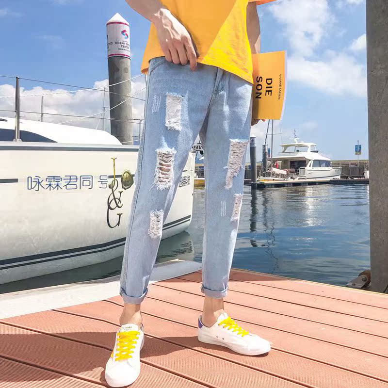 l'été version coréenne de la tendance de la ripped jeans des hommes slim joker petits pieds pantalon port de vent étudiant était mince mendiant pantalon l'été version coréenne de la tendance de la ripped jeans des hommes slim joker petits pieds pantalon port de vent étudiant était mince mendiant pantalon