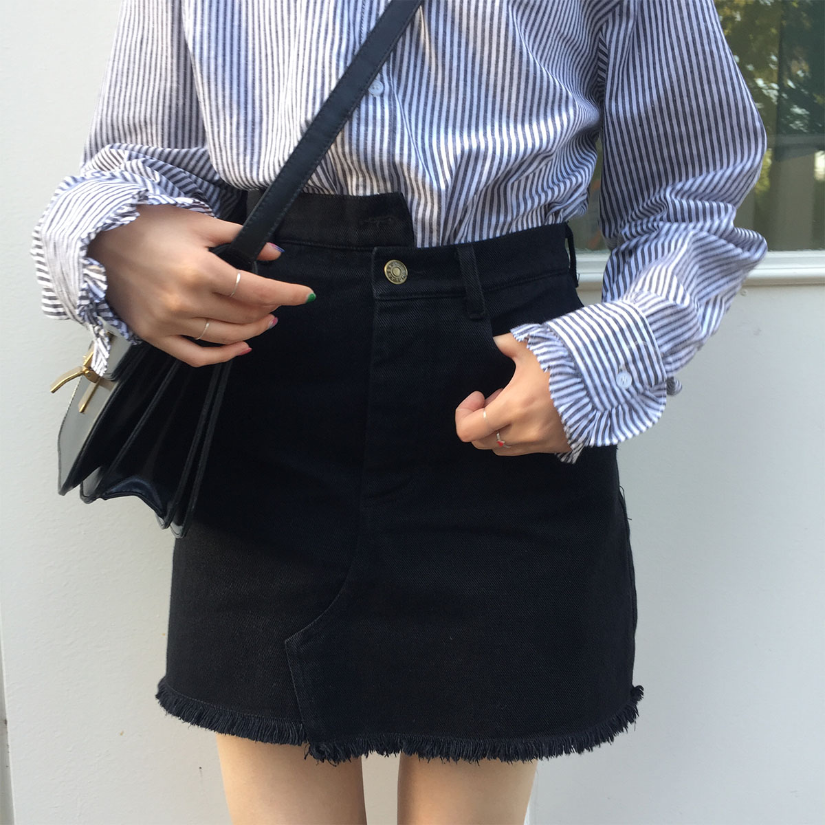 陆小团团 韩国新款百搭显瘦学生腰身不规则A字裙毛边牛仔半身裙。
