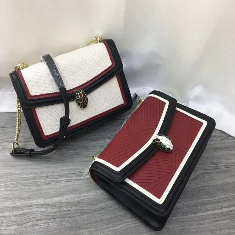 en 2019, la nouvelle femme sac en cuir d'agneau brodé colorblock émail tête de tête de serpent sac à bandoulière unique messenger en cuir de mode sac en 2019, la nouvelle femme sac en cuir d'agneau brodé colorblock émail tête de tête de serpent sac à bandoulière unique messenger en cuir de mode sac