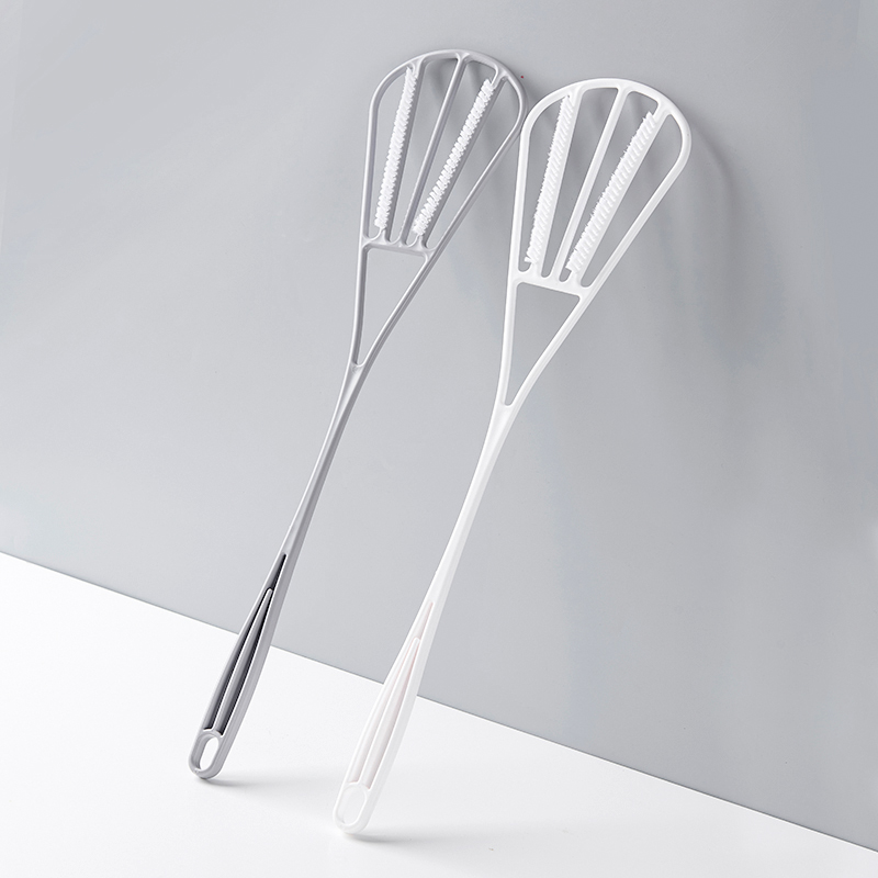 a quilt beater with long handle and double sides for cleaning and beating quilt