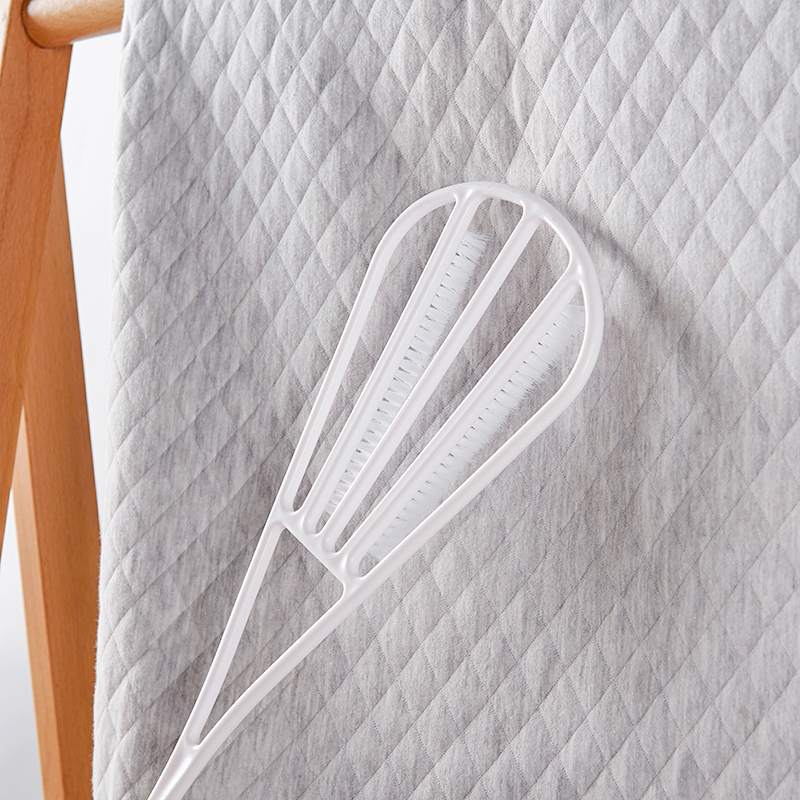 a quilt beater with long handle and double sides for cleaning and beating quilt