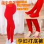 Mùa thu và mùa đông dày cỡ lớn cộng với nhung ấm bước trên đôi chân và nâng đỡ dạ dày màu đỏ kết hôn của phụ nữ mang thai quần legging quần tây quần legging bầu