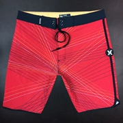 Trò chơi thể dục nam quần đi biển màu đỏ quần rộng kích thước lớn năm quần mùa hè nhanh khô lướt quần short thể thao - Quần bãi biển