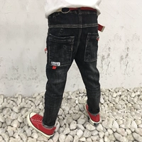 Quần jean bé trai màu đen 2019 phiên bản mới của Hàn Quốc cho bé quần dài đơn giản Quần dài co giãn chân thủy triều - Quần jean quan ao babi