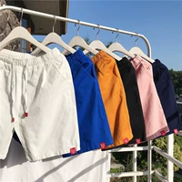 2018 thanh niên nam mới ghi nhãn quần short mùa hè triều nam ins với cùng một đoạn năm quần những người yêu thích quần short giản dị áo gió nam