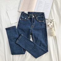 RENA mùa thu và mùa đông cổ điển hoang dã màu xanh đậm retro cao eo co giãn Slim quần đơn giản chân denim quần jean nữ thu đông