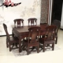 Bàn ăn gỗ hồng mộc Indonesia mới phong cách Trung Quốc gỗ gụ đồ nội thất lá rộng gỗ hồng sắc hình chữ nhật 7 cái đặt ghế Dongfei gỗ hồng sắc - Bộ đồ nội thất mẫu bàn ghế phòng khách hiện đại