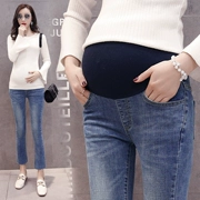 Quần bà bầu mùa thu đông giảm béo phiên bản Hàn Quốc của quần ống loe denim nâng bụng quần mẹ mặc bà bầu mang quần