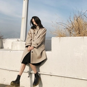 Zhuangzhuang mùa đông Hàn Quốc tính khí áo dài nữ chic len áo cao đẳng gió áo len thủy triều