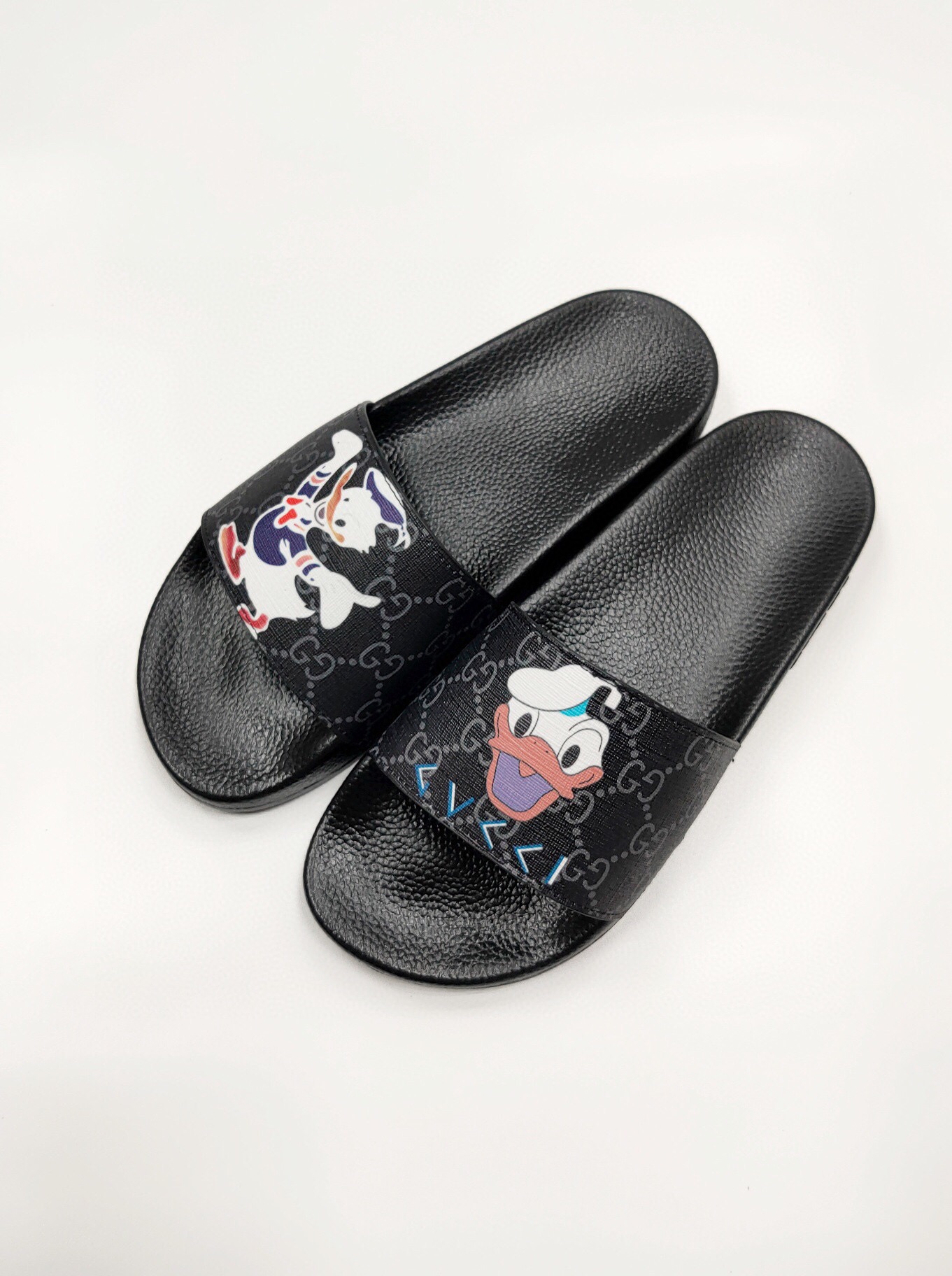 Donald DuckEuropean station slipper summer trend fashion genuine leather flip flops Wear out Sandals personality non-slip Flip flop shoes male