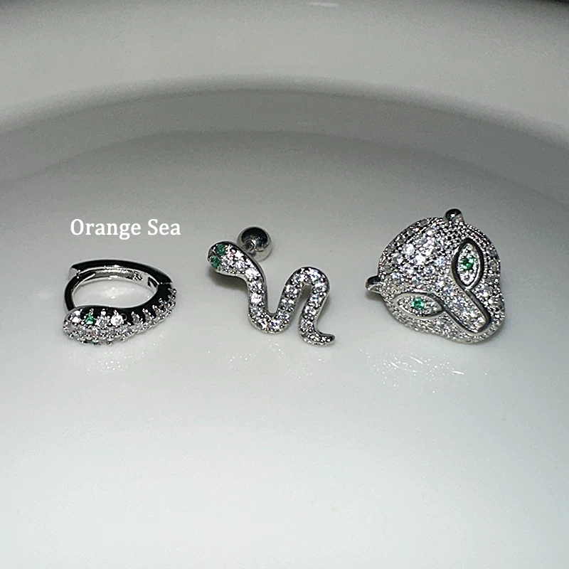 Оранжевые морские супер-ускоряющие острые серьги Девушка дикий Diamond Зеленый глаз Змея Леопард Ниша Винт Ear Bone Nail