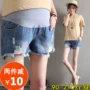 Thai sản mới jeans mặc quần thai sản mùa hè lỏng thường kích thước lớn quần áo thai sản mùa hè dạ dày lift quần short đồ bầu thời trang