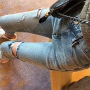 Hồng Kông gió chic retro eo cao thon gọn quần lọt khe quần jeans nữ mùa thu mới phiên bản Hàn Quốc của quần dài chín quần