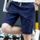 Mùa hè phiên bản Hàn Quốc mới của xu hướng quần short thể thao giản dị nam mùa hè in cá tính Quần cotton 5 điểm nam mỏng - Quần short