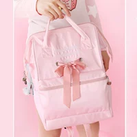 Розовая подвеска с бантиком