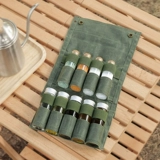 Сумка для хранения бутылок с приправами для приправы приправы приправить сочетание бутылочных бутылок. Комбинирование бутылочных бутылок.