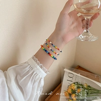 Милый браслет, плетеный дизайнерский аксессуар, в цветочек, тренд сезона