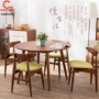 Mới Trung Quốc phong cách gỗ tròn tròn bàn ăn tối giản hiện đại tối giản bàn ăn và ghế kết hợp 1 bàn 6 8 ghế Zen nội thất tùy chỉnh - Bộ đồ nội thất ghế sofa đẹp hiện đại giá rẻ