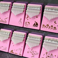 Máy cầm tay Kalimba ngón tay cái 17 tông màu hồng ngón tay người chơi đàn piano kalimba thẻ bạch huyết nhập cụ - Nhạc cụ phương Tây kèn đồng