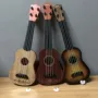 Đồ chơi guitar trẻ em có thể chơi mô phỏng hạt gỗ lớn ukulele người mới bắt đầu nhạc cụ âm nhạc piano nam cô gái - Đồ chơi nhạc cụ cho trẻ em đàn ukulele cho bé