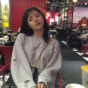 Cao đẳng phong cách retro cá tính lỗ lỏng áo len của phụ nữ Hàn Quốc phiên bản của mùa xuân sinh viên hoang dã áo t-shirt áo sơ mi nữ