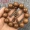 Hàng trực tiếp gỗ đàn hương lụa vàng chính hãng Shenshui 8 mm108 Seiko lỗ nhỏ nam và nữ vài vòng tay nhà máy trực tiếp - Vòng đeo tay Clasp