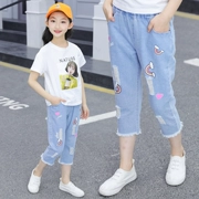 Cô gái quần jeans mùa hè quần ống lỗ quần jean trong cô gái lớn cắt quần trắng quần jeans trẻ em - Quần jean