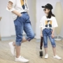 Quần áo trẻ em năm quần trong bàn chân của trẻ em lớn lỏng Hàn Quốc phiên bản 2018 mùa hè mỏng 12 tuổi 15 cô gái quần jeans kinh doanh quần áo trẻ em
