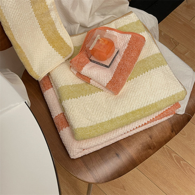 taobao agent Little white rabbit coral velvet pineapple grid striped bath towel 2 sets