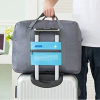 Túi du lịch gấp túi lưu trữ xách tay màu sắc tươi công suất lớn di chuyển vận chuyển hàng không túi xách tay hành lý đơn giản túi du lịch mini