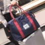 Hành lý nhỏ nữ túi du lịch khoảng cách ngắn nam vải nhẹ Mini phiên bản Hàn Quốc của túi hành lý xách tay du lịch gói đơn giản thủy triều túi du lịch
