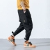 Quần nam phiên bản Hàn Quốc của xu hướng quần chín nam thương hiệu quần lửng ống rộng nam giản dị 9 điểm quần chân harem hè quần đùi Quần Harem