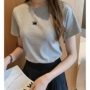 Mùa hè 2019 mới của phụ nữ thời trang áo thun thêu nữ áo ngắn tay rộng cổ tròn nửa áo thun tay lửng - Áo phông áo phông nữ rộng