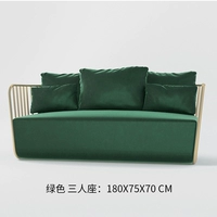 Малахитовый зелёный диван