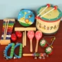 Orff nhạc cụ trống đồ chơi trẻ em trống bộ gõ trống bé âm nhạc giáo dục sớm tay tay trống trống chuông cổ tay cho bé