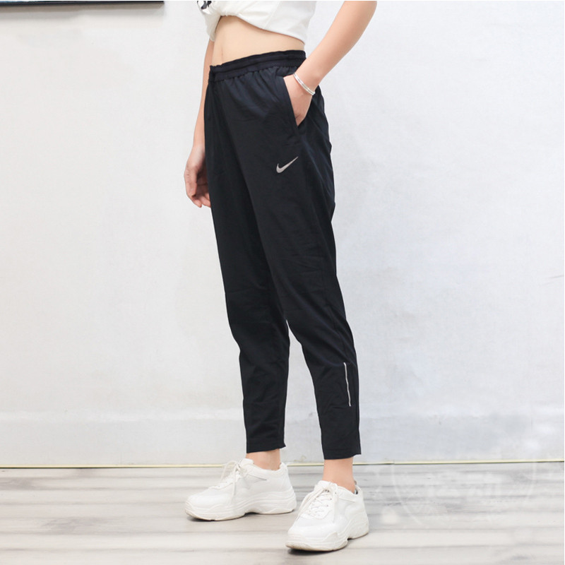 Cd8219-010 New 3M ReflectorNike Nike Women's trousers motion trousers spring new pattern Casual pants Shut up Pencil Pants BV 2899