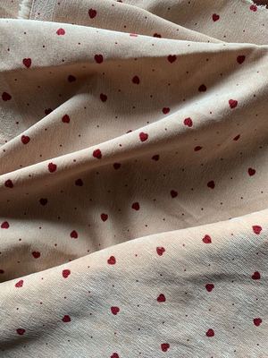 taobao agent Ultra -soft silk light light core velvet loving point printed pajamas fabric baby clothing fabric