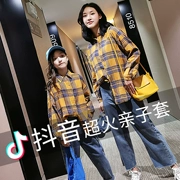 Quần áo trẻ em mùa thu gia đình vừa vặn áo sơ mi 2019 phiên bản Hàn Quốc mới của mẹ áo sơ mi kẻ sọc phương Tây áo sơ mi dài tay trẻ em - Áo sơ mi dài tay