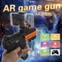 AR Game Gun Children Toy Gun VR Thực tế ảo Xử lý phụ kiện Bluetooth 4D Súng ngắn trò chơi Somatosensory súng đồ chơi như thật