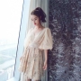 Cheng Haoer new ladies apricot lưới đèn lồng tay áo sexy V-Cổ màu sequins cao eo kỳ nghỉ ăn mặc 	váy xoắn eo	