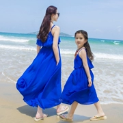 Hai loại phương pháp mặc Váy đi biển dành cho phụ huynh-trẻ em quây quây Đầm voan xanh - Trang phục dành cho cha mẹ và con