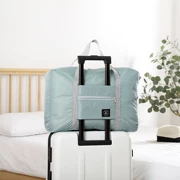 Túi du lịch xách tay nữ di động gấp túi lưu trữ nam túi dung lượng lớn phụ nữ mang thai chờ gói có thể được đặt trường hợp xe đẩy - Vali du lịch