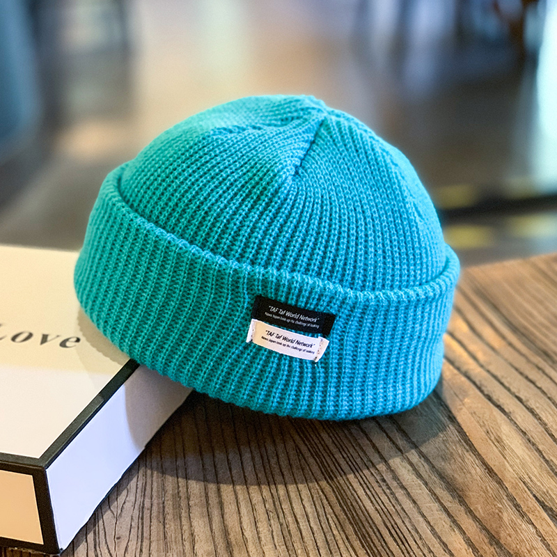 Peacock green/double row letter mark melon skin hat