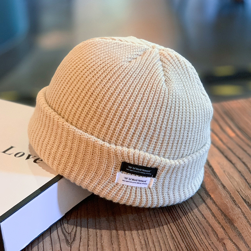 Beige/double row letter mark melon skin hat
