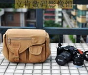 Nikon Small Retro Canvas Da Trang trí Máy ảnh DSLR ngoài trời Casual Một vai Chụp ảnh Túi đeo chéo Bán nóng - Phụ kiện máy ảnh kỹ thuật số