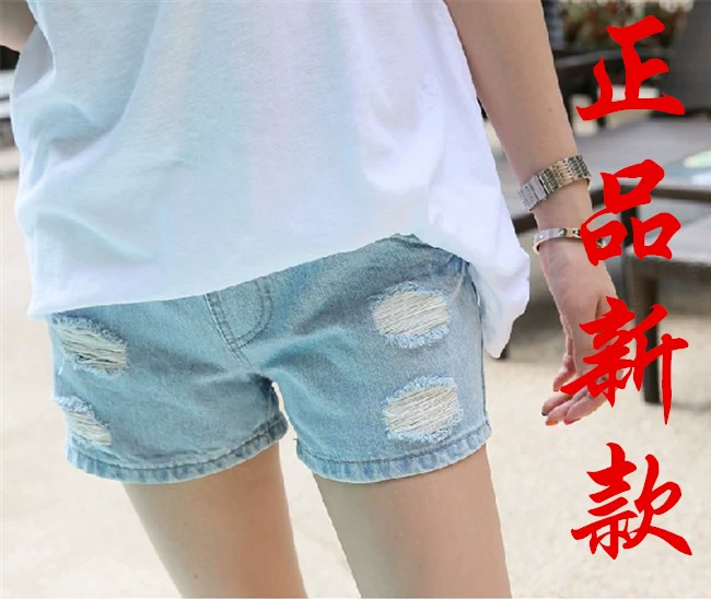 Phiên bản Hàn Quốc của mùa hè bà bầu mới mặc quần đùi bà bầu denim rách - Phụ nữ mang thai quần / quần bụng