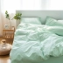 Bông giặt đôi bốn mảnh bông màu tinh khiết Bắc Âu khỏa thân ngủ đơn giản giường, khăn trải giường cotton sinh viên ba mảnh