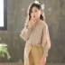 Quần áo trẻ em 2019 mùa xuân Hàn Quốc Cô gái bông trắng Đèn lồng tay áo Big Boy đứng cổ áo sơ mi lỏng lẻo - Áo sơ mi Áo sơ mi